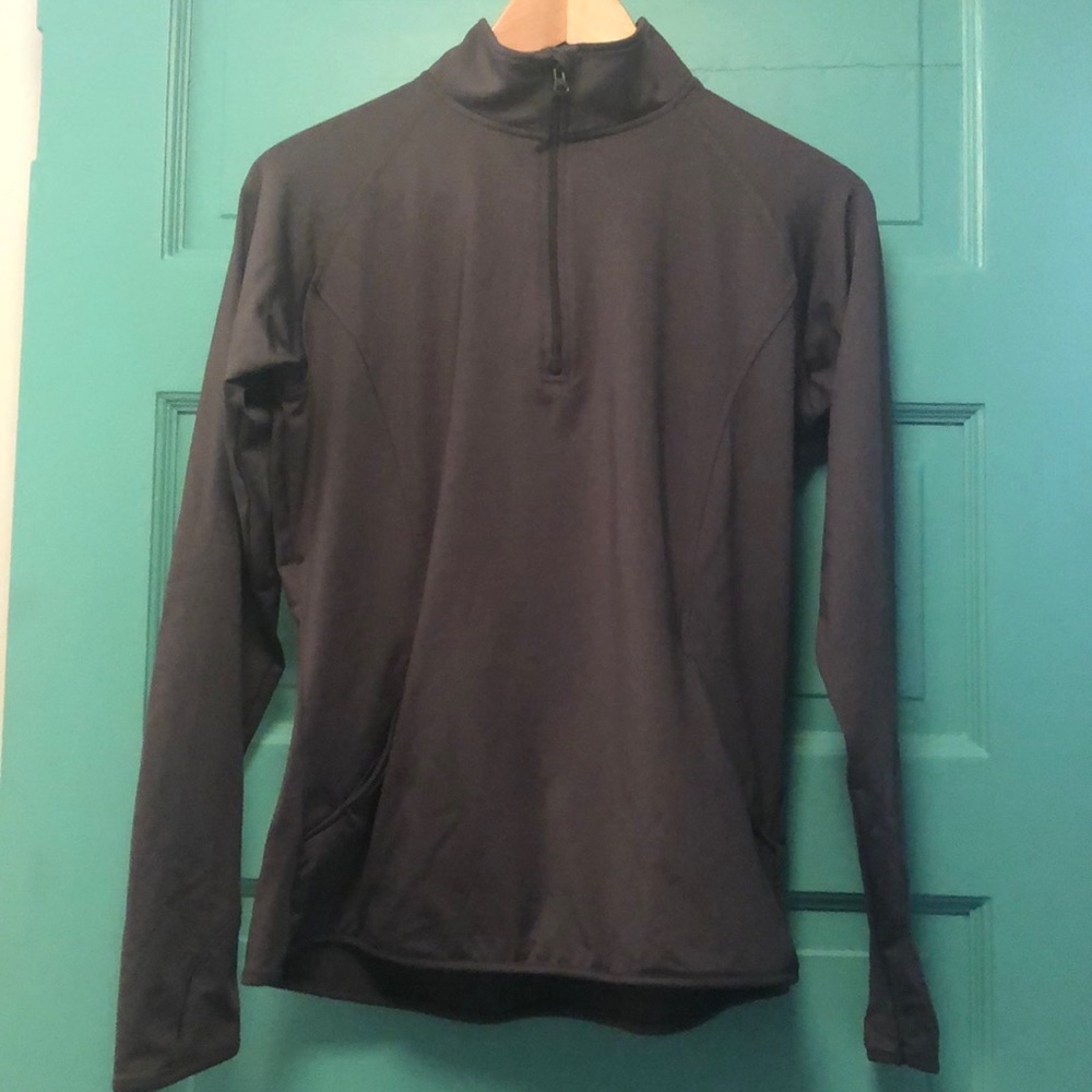 Ladies quarter zip warm up jacket.